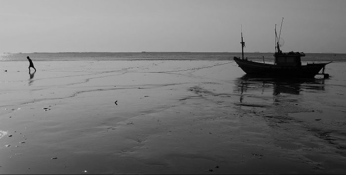 Fisherman on Krating Lai beach, Pattaya, Thailand