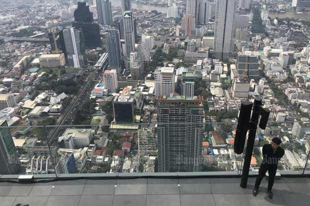 An aerial view of high-rise buildings from Bangkok's iconic King Power Mahanakhon Building. (Photo: Wisit Thamngern)