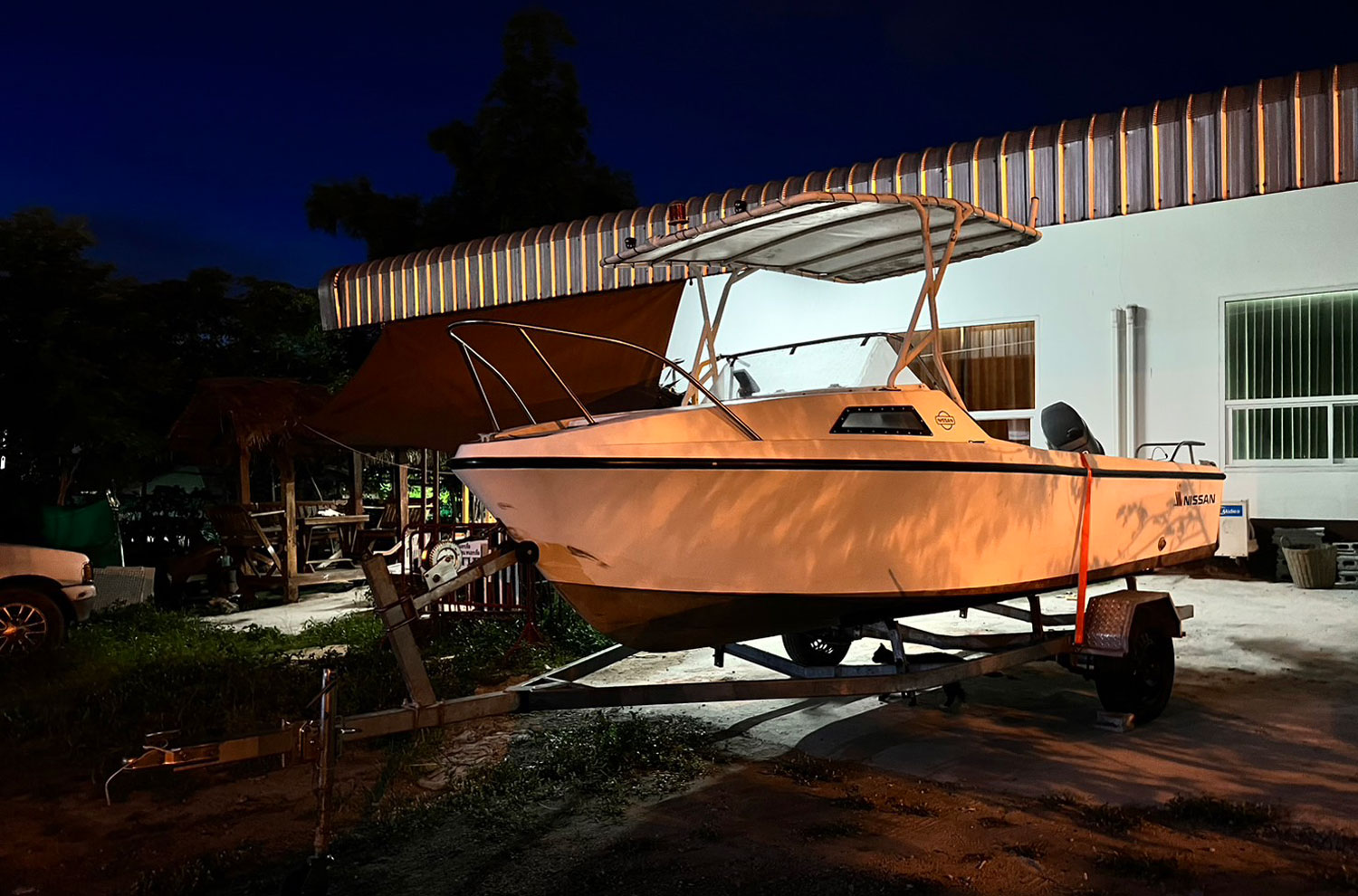 A speedboat belonging to murder suspect Olaf Brinkmann is seen at the house of a friend in Pattaya. (Photo: Thiwakorn Kritmanee)